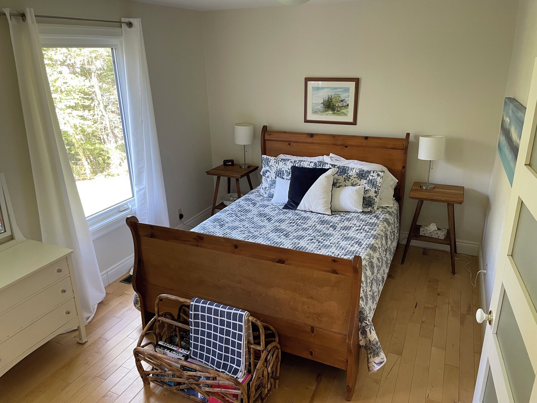 Bedroom with a wooden sleigh bed